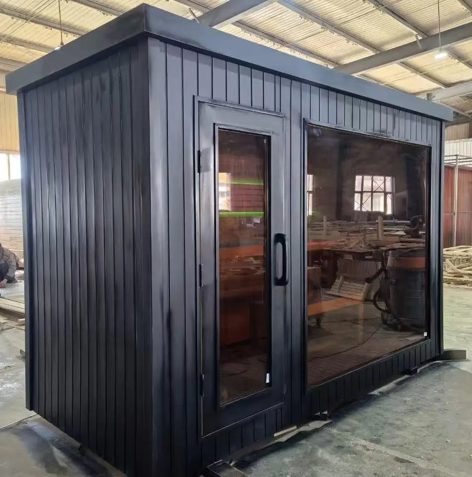 The Modern Hemlock Outdoor Sauna Is Equipped With A Villa Stove And Stones